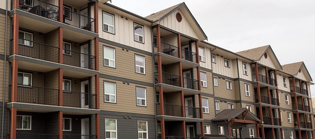 Exterior of an apartment building at 900, 901 & 904 100A Avenue in Dawson Creek, British Columbia